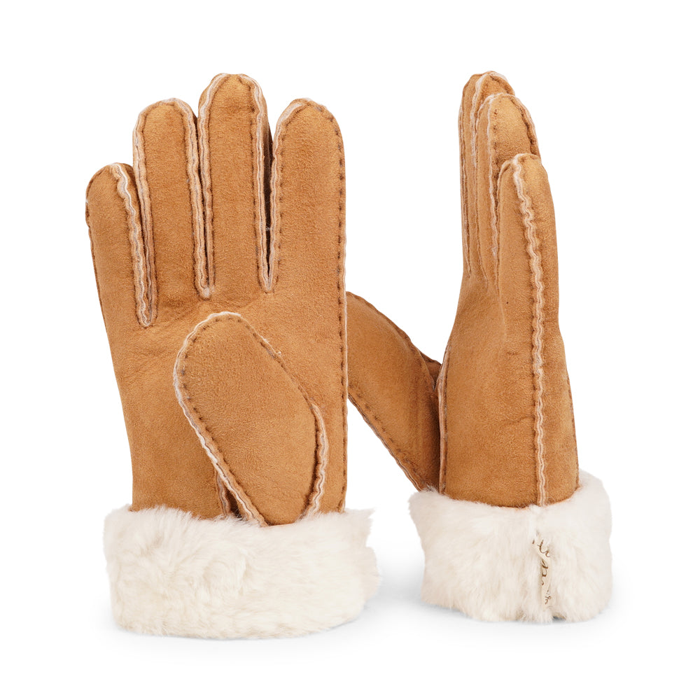 Elevate your winter wardrobe with our luxurious Kelly Shearling Gloves. Crafted from supple sheep leather, these gloves are designed to provide you with both style and warmth during the colder months.
These gloves are uniquely long and slim, providing a sleek and feminine silhouette that not only keeps you warm but also adds a chic touch to any outfit.