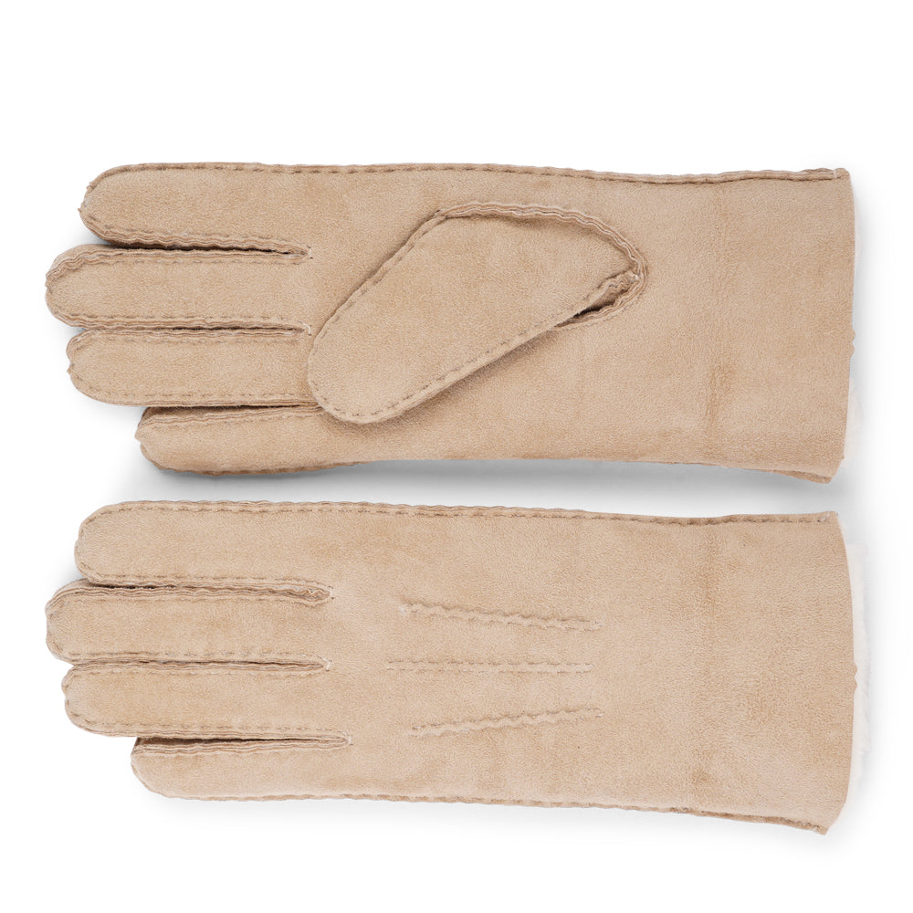Elevate your winter wardrobe with our luxurious Kelly Shearling Gloves. Crafted from supple sheep leather, these gloves are designed to provide you with both style and warmth during the colder months.
These gloves are uniquely long and slim, providing a sleek and feminine silhouette that not only keeps you warm but also adds a chic touch to any outfit.