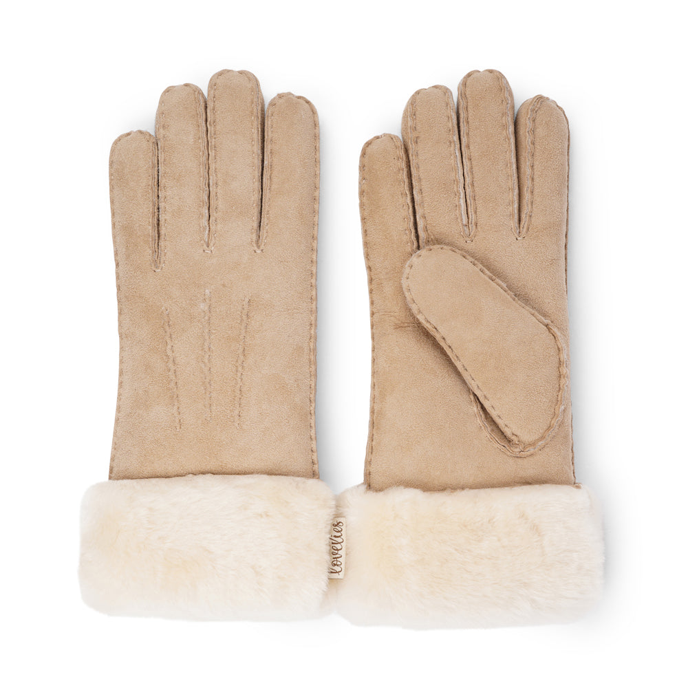 Lovelies Studio - Enhance your winter style with our luxurious Kelly Long Shearling Gloves. Made from soft sheep leather, these gloves offer a perfect blend of sophistication and warmth for the colder seasons.
Their elongated, slim design creates a sleek, feminine silhouette, ensuring you stay cozy while adding a chic, polished finish to any outfit.