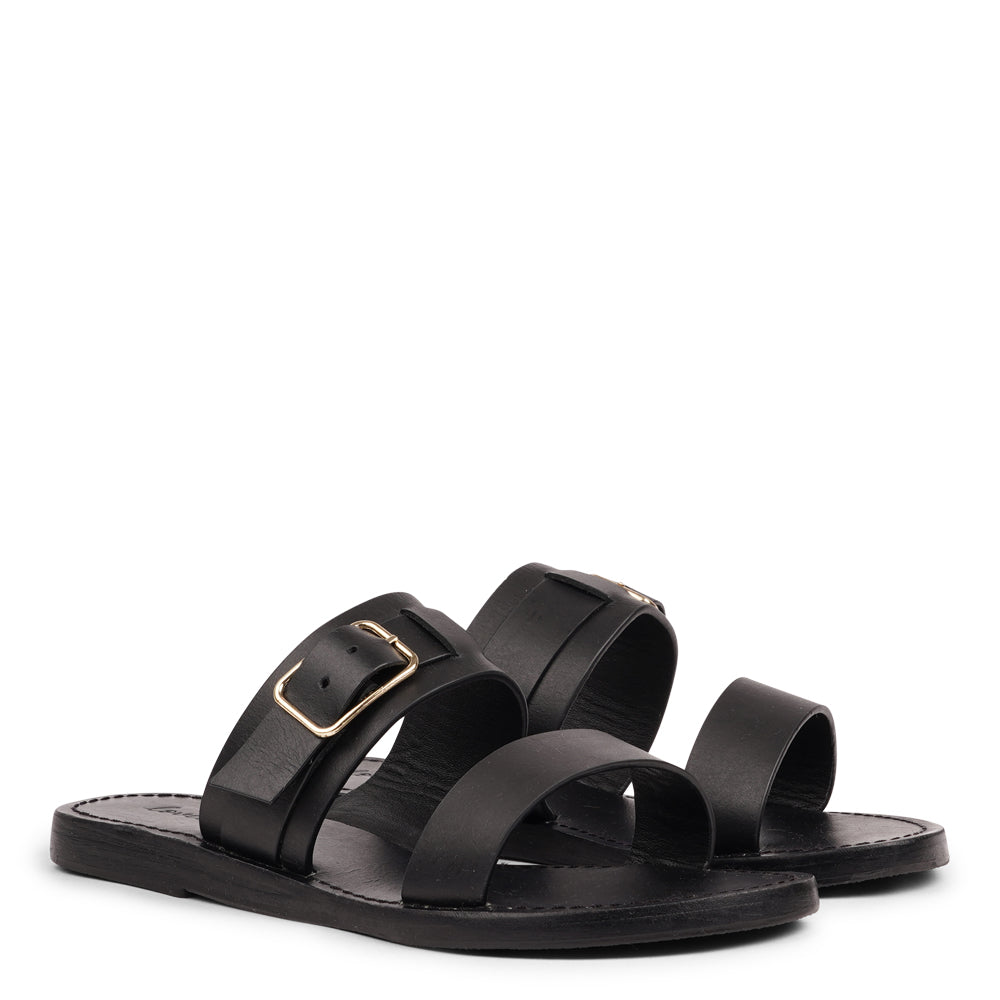 Lacco is our beautifully handcrafted leather sandal, designed to bring feminine elegance and all-day ease to your wardrobe. Featuring a single adjustable buckle for a secure, personalized fit, Lacco strikes the perfect balance between style and functionality.
Made from vegetable-tanned buffalo leather, the soft yet sturdy straps offer lasting comfort. The leather sole with a rubber grip provides reliable traction, whether you're dressing up or keeping it casual.
