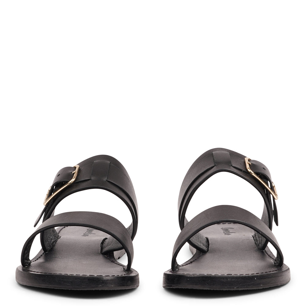 Lacco is our beautifully handcrafted leather sandal, designed to bring feminine elegance and all-day ease to your wardrobe. Featuring a single adjustable buckle for a secure, personalized fit, Lacco strikes the perfect balance between style and functionality.
Made from vegetable-tanned buffalo leather, the soft yet sturdy straps offer lasting comfort. The leather sole with a rubber grip provides reliable traction, whether you're dressing up or keeping it casual.