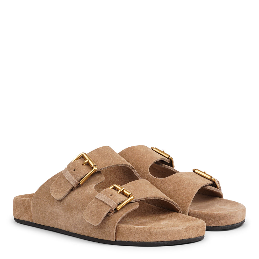 Lovelies Studio - Denmark - Effortlessly laid-back with a touch of understated luxury, these suede sandals are designed for all-day comfort and timeless appeal. Crafted from rich, soft suede, they feature two wide straps with adjustable gold-tone buckles for a customizable fit. The contoured footbed offers light support, while the flexible sole ensures ease of movement from indoors to out.
Perfect for casual days, warm getaways, or everyday lounging in style.