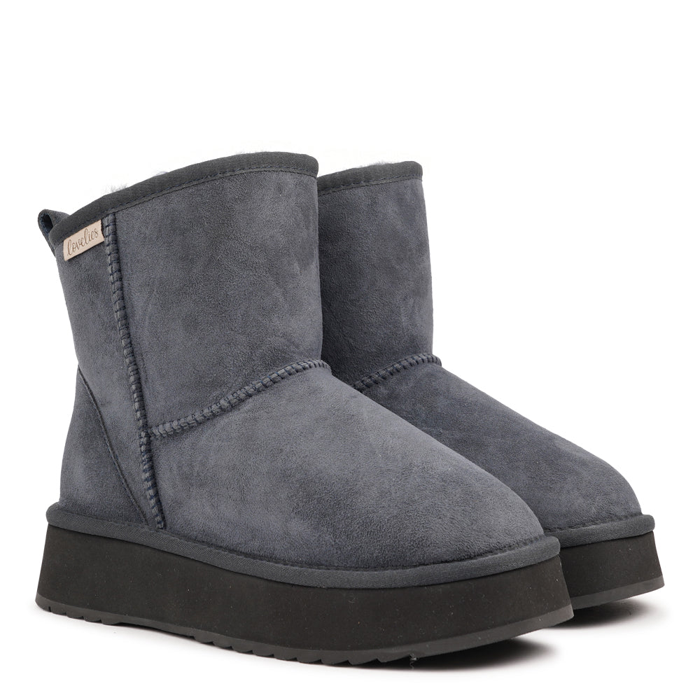 Designed for your ultimate comfort, these luxurious shearling boots are the perfect winter companions. Featuring soft, durable rubber soles, they ensure you can step through the colder months with confidence, keeping your feet well-protected from the elements. 
But Laveno offers more than just practicality—these boots blend warmth and style seamlessly, making them as fashionable as they are functional.