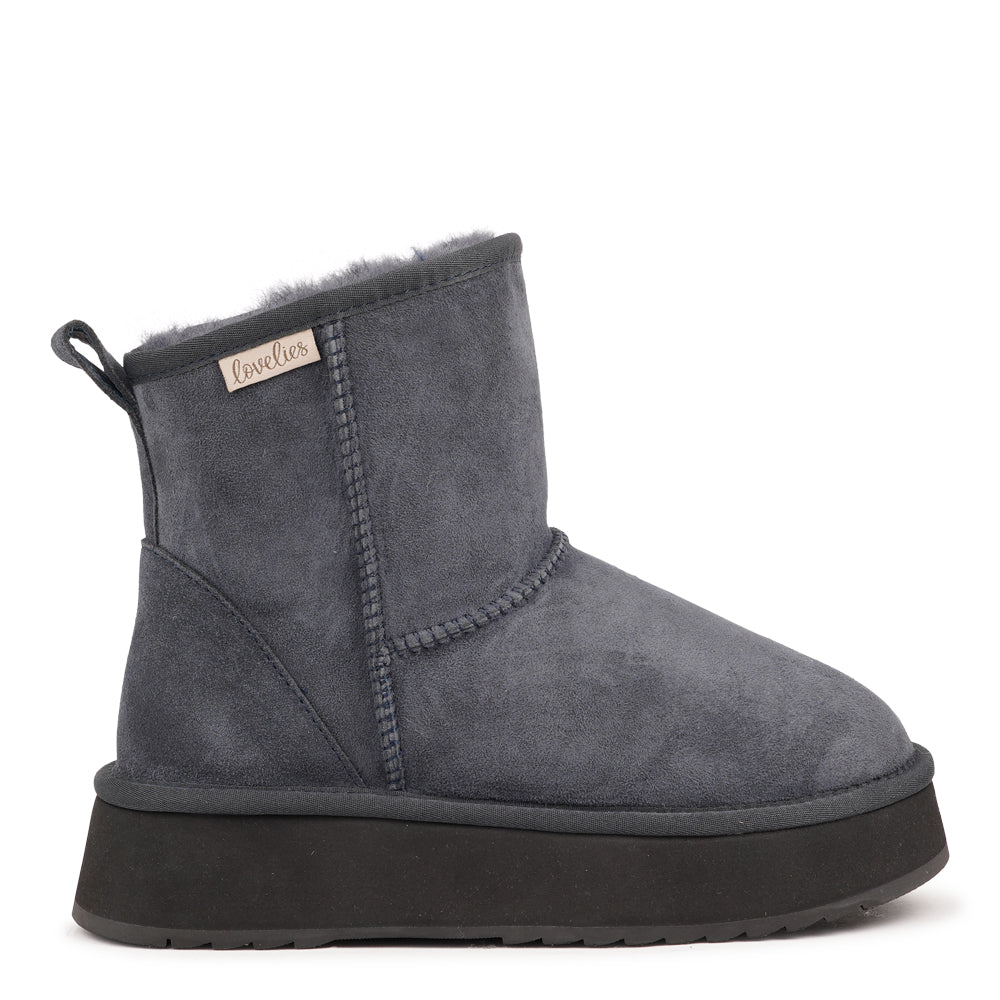 Designed for your ultimate comfort, these luxurious shearling boots are the perfect winter companions. Featuring soft, durable rubber soles, they ensure you can step through the colder months with confidence, keeping your feet well-protected from the elements. 
But Laveno offers more than just practicality—these boots blend warmth and style seamlessly, making them as fashionable as they are functional.