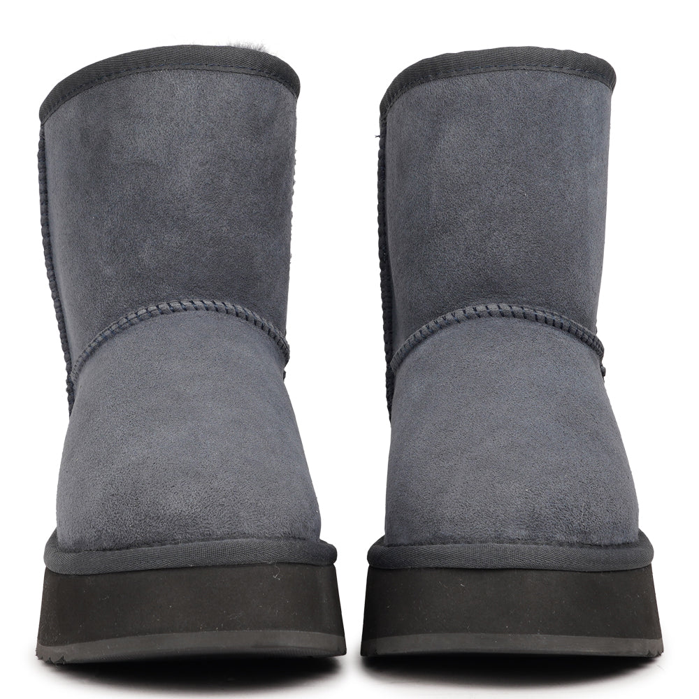 Designed for your ultimate comfort, these luxurious shearling boots are the perfect winter companions. Featuring soft, durable rubber soles, they ensure you can step through the colder months with confidence, keeping your feet well-protected from the elements. 
But Laveno offers more than just practicality—these boots blend warmth and style seamlessly, making them as fashionable as they are functional.