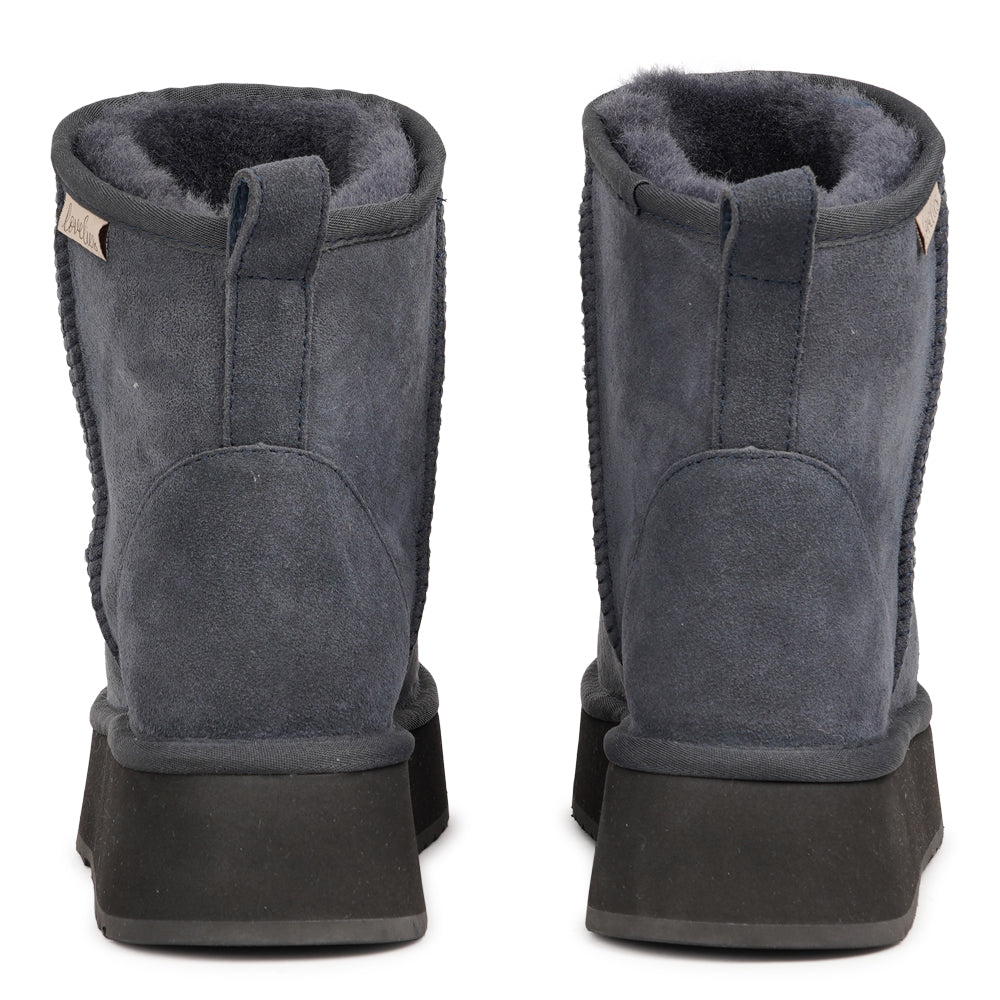 Designed for your ultimate comfort, these luxurious shearling boots are the perfect winter companions. Featuring soft, durable rubber soles, they ensure you can step through the colder months with confidence, keeping your feet well-protected from the elements. 
But Laveno offers more than just practicality—these boots blend warmth and style seamlessly, making them as fashionable as they are functional.