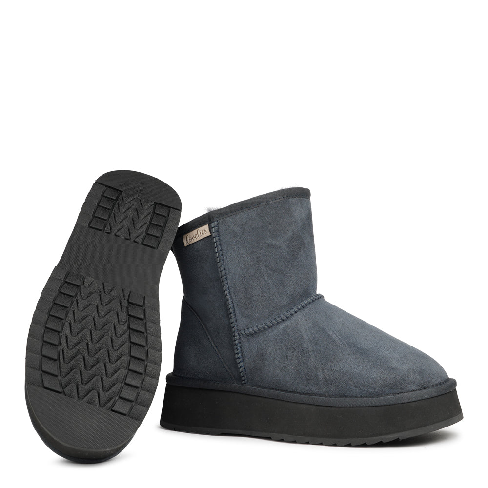 Designed for your ultimate comfort, these luxurious shearling boots are the perfect winter companions. Featuring soft, durable rubber soles, they ensure you can step through the colder months with confidence, keeping your feet well-protected from the elements. 
But Laveno offers more than just practicality—these boots blend warmth and style seamlessly, making them as fashionable as they are functional.