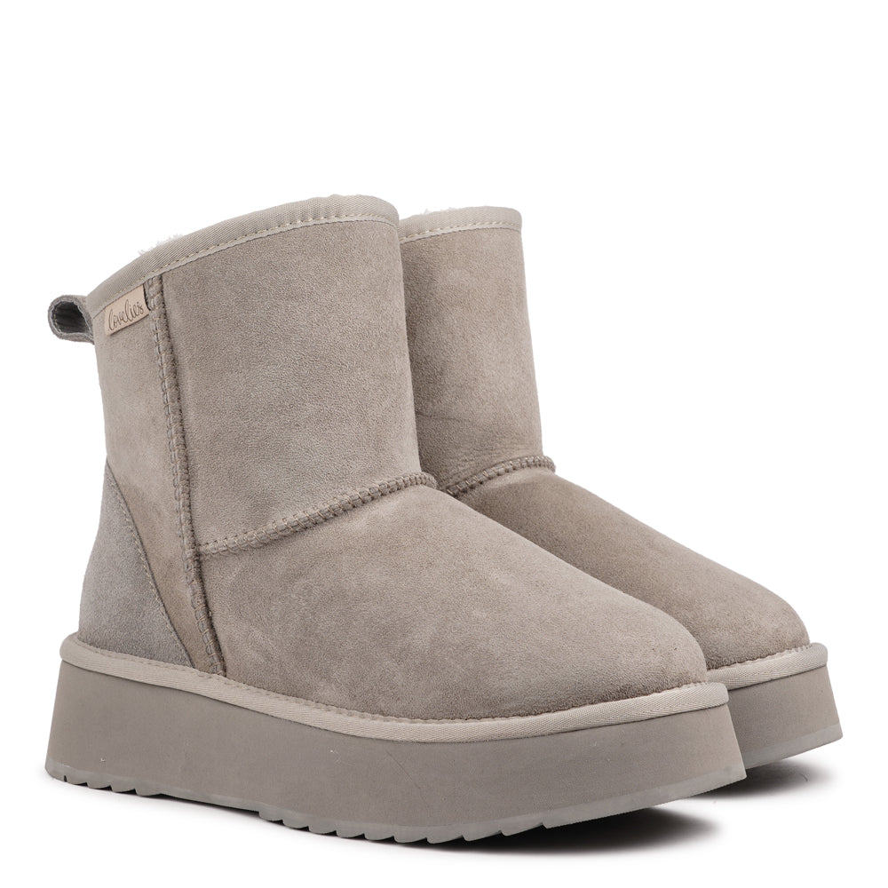 Designed for your ultimate comfort, these luxurious shearling boots are the perfect winter companions. Featuring soft, durable rubber soles, they ensure you can step through the colder months with confidence, keeping your feet well-protected from the elements. 
But Laveno offers more than just practicality—these boots blend warmth and style seamlessly, making them as fashionable as they are functional.