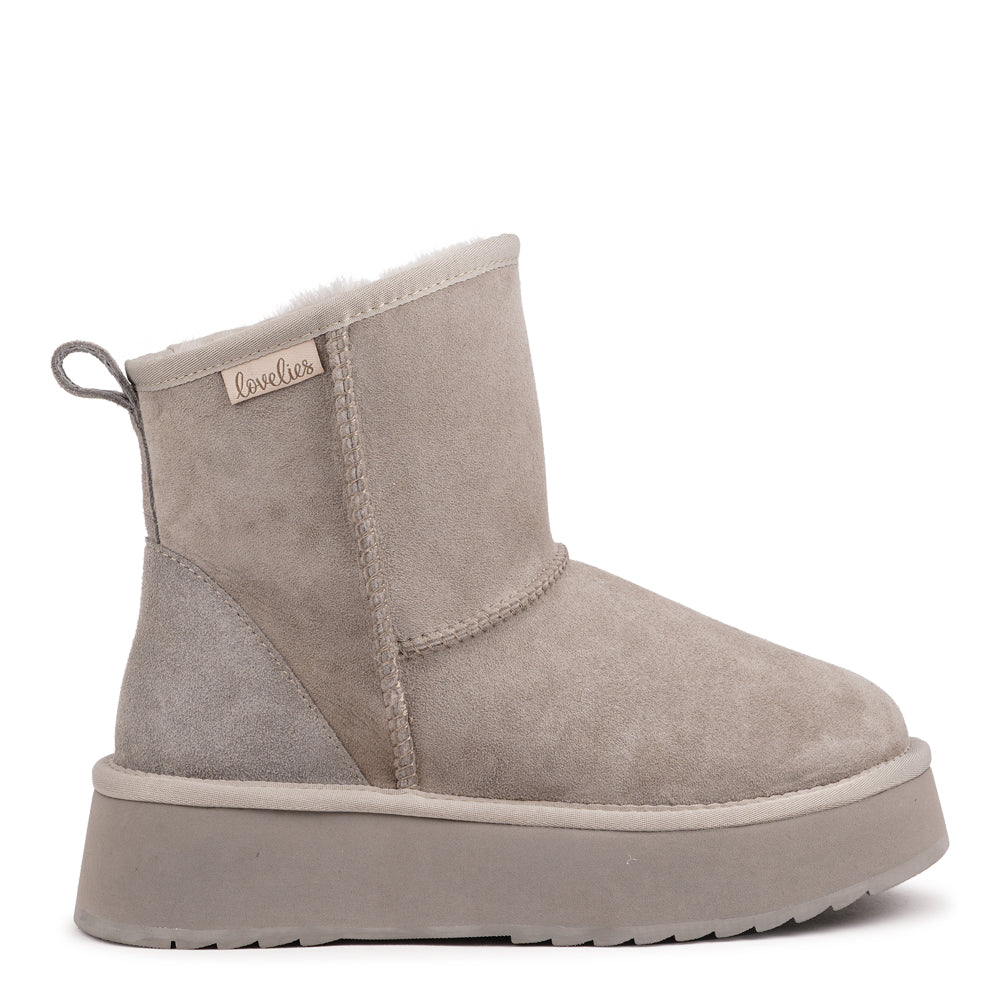 Designed for your ultimate comfort, these luxurious shearling boots are the perfect winter companions. Featuring soft, durable rubber soles, they ensure you can step through the colder months with confidence, keeping your feet well-protected from the elements. 
But Laveno offers more than just practicality—these boots blend warmth and style seamlessly, making them as fashionable as they are functional.