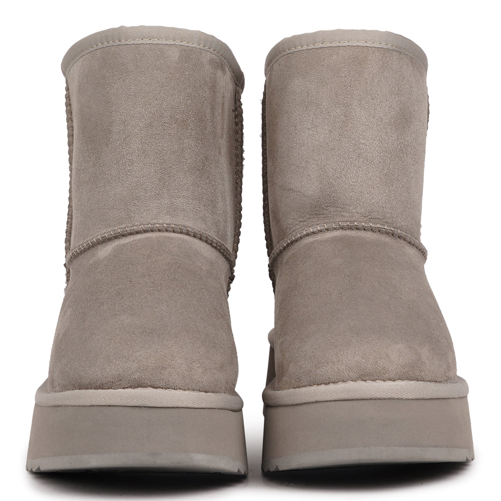 Designed for your ultimate comfort, these luxurious shearling boots are the perfect winter companions. Featuring soft, durable rubber soles, they ensure you can step through the colder months with confidence, keeping your feet well-protected from the elements. 
But Laveno offers more than just practicality—these boots blend warmth and style seamlessly, making them as fashionable as they are functional.