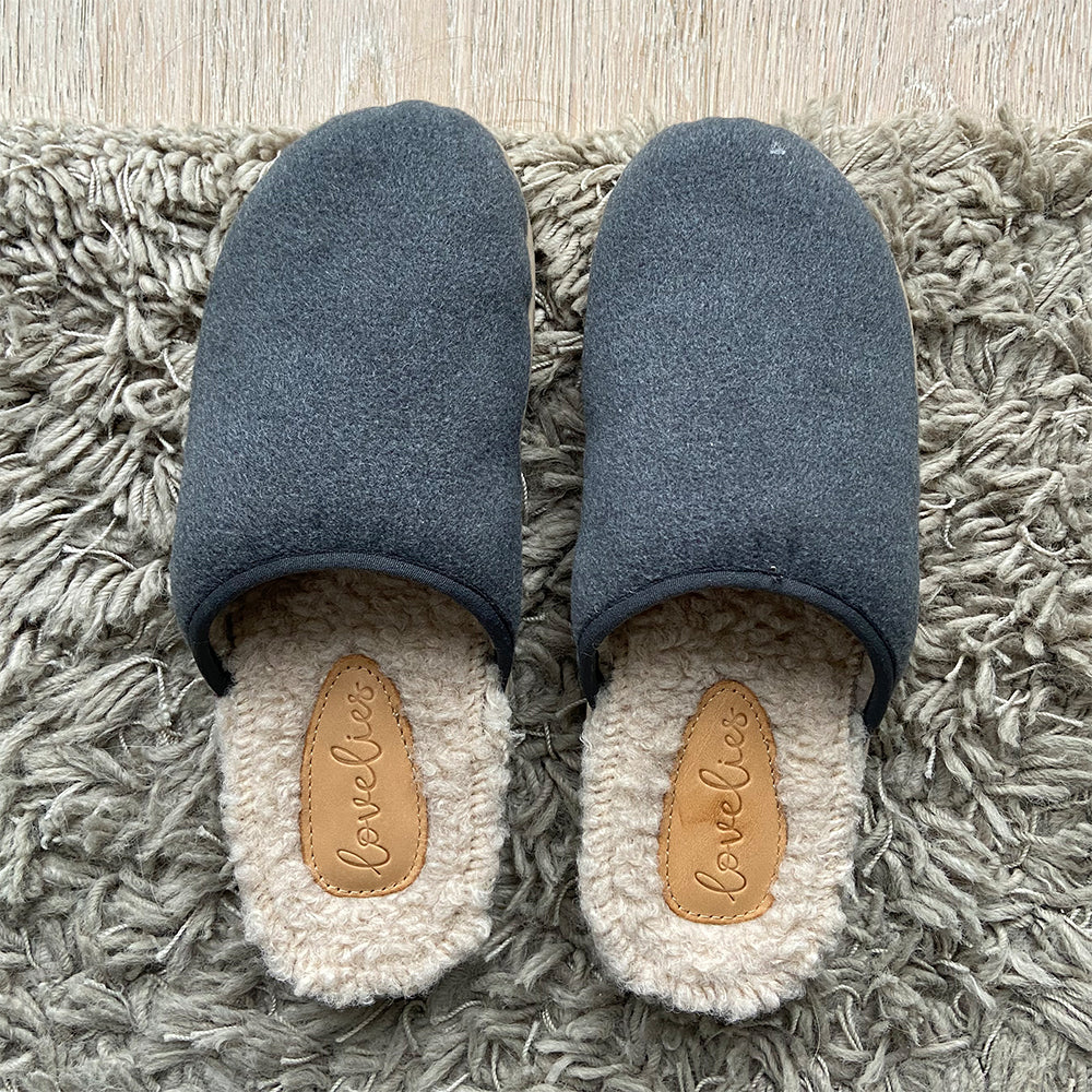 These slip-on wonders redefine the essence of coziness. When your feet crave the embrace of soft and warm slippers, Soori is the solution. Featuring plush yet durable soles, premium wool, and a stunning design, these lounge slippers are a luxurious retreat for your feet. Once you experience the unmatched comfort of Soori, you'll never want to slip into any other home-shoe, making every step a blissful journey of ease and style.