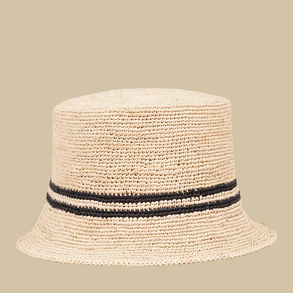 Lovelies Studio - Made from raffia, a natural fiber renowned for its durability and flexibility, the Marconi bucket hat is not only stylish but also eco-friendly. The raffia is carefully colored by hand using traditional methods and left to dry naturally in the warm sun, ensuring minimal environmental impact.