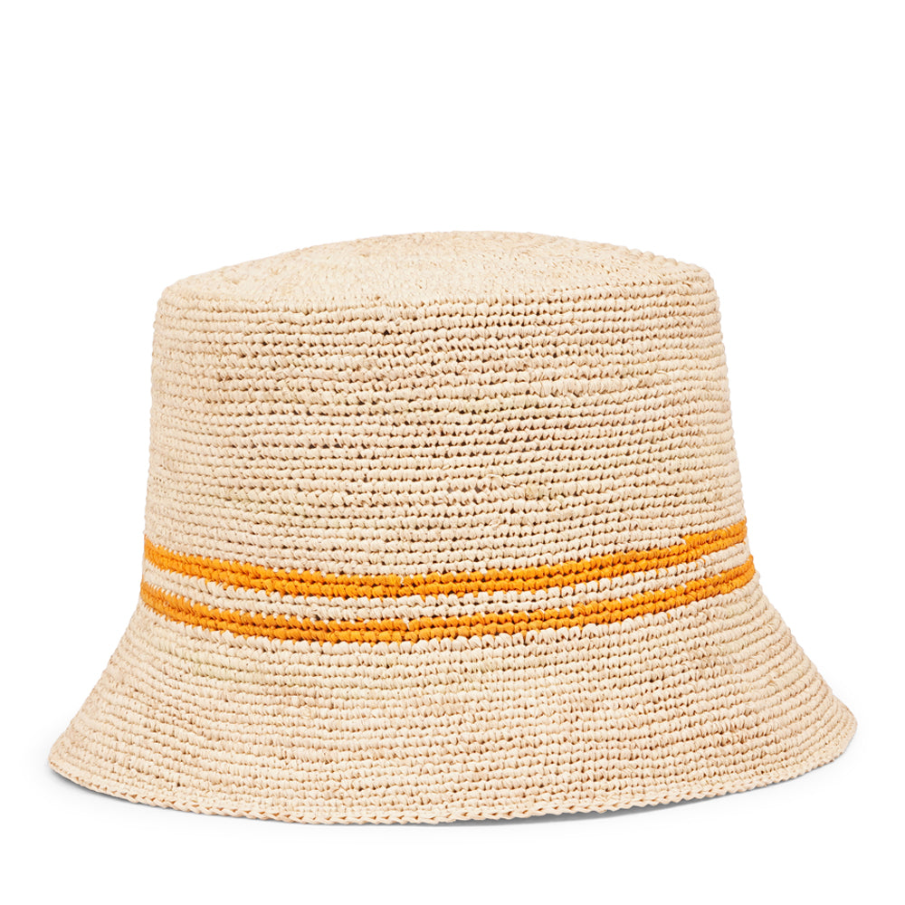 Lovelies Studio - The Marconi bucket hat, a stunning creation meticulously crafted by local artisans in Madagascar exclusively for Lovelies Studio. Made from raffia, a natural fiber renowned for its durability and flexibility, the Marconi bucket hat is not only stylish but also eco-friendly. The raffia is carefully colored by hand using traditional methods and left to dry naturally in the warm sun, ensuring minimal environmental impact.