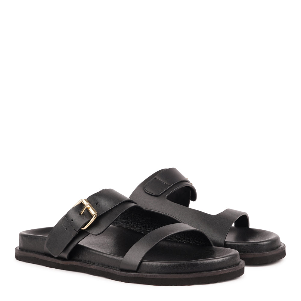 Marina - a beautifully handcrafted leather sandal that blends feminine elegance with everyday comfort. Designed with a single adjustable strap, it offers a secure, personalized fit that moves effortlessly with you throughout the day.
Crafted from vegetable-tanned buffalo leather, the soft yet durable straps are made to age beautifully over time. Finished with a discreet rubber grip, Marina provides stability and ease - perfect for both relaxed daytime wear and more refined evening looks.
