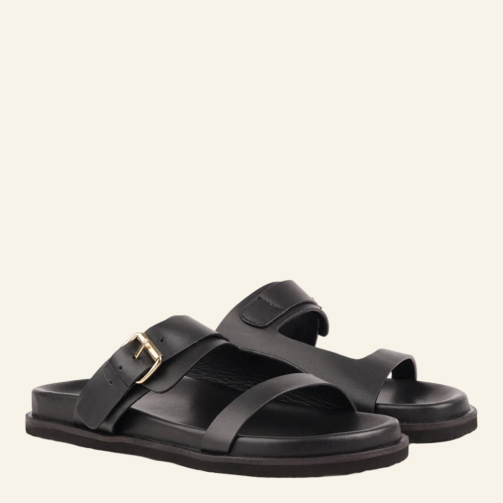 Marina - a beautifully handcrafted leather sandal that blends feminine elegance with everyday comfort. Designed with a single adjustable strap, it offers a secure, personalized fit that moves effortlessly with you throughout the day.
Crafted from vegetable-tanned buffalo leather, the soft yet durable straps are made to age beautifully over time. Finished with a discreet rubber grip, Marina provides stability and ease - perfect for both relaxed daytime wear and more refined evening looks.