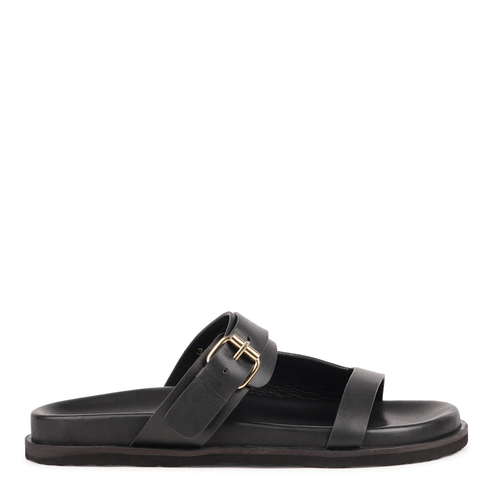 Marina - a beautifully handcrafted leather sandal that blends feminine elegance with everyday comfort. Designed with a single adjustable strap, it offers a secure, personalized fit that moves effortlessly with you throughout the day.
Crafted from vegetable-tanned buffalo leather, the soft yet durable straps are made to age beautifully over time. Finished with a discreet rubber grip, Marina provides stability and ease - perfect for both relaxed daytime wear and more refined evening looks.