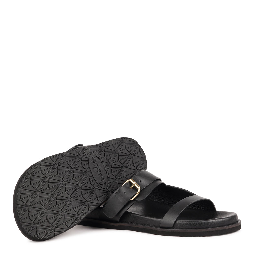 Marina - a beautifully handcrafted leather sandal that blends feminine elegance with everyday comfort. Designed with a single adjustable strap, it offers a secure, personalized fit that moves effortlessly with you throughout the day.
Crafted from vegetable-tanned buffalo leather, the soft yet durable straps are made to age beautifully over time. Finished with a discreet rubber grip, Marina provides stability and ease - perfect for both relaxed daytime wear and more refined evening looks.
