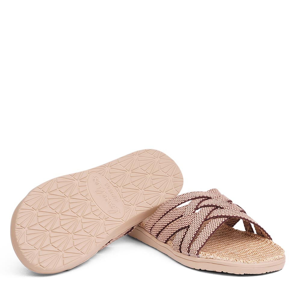 Discover the captivating Matara sandal, named after the enchanting beach of Sri Lanka.
This sumptuous sandal is composed of luxuriantly soft and resilient gum rubber, with a natural jute innersole. The closely woven cotton straps infuse a delicate and fanciful aesthetic, providing an effortless sophistication for any ensemble.
With its delicate and soft fabrics, you feel at ease and elegant at the same time. The easy to-go sandals with their striking summer colors are a perfect fit to your feminine
