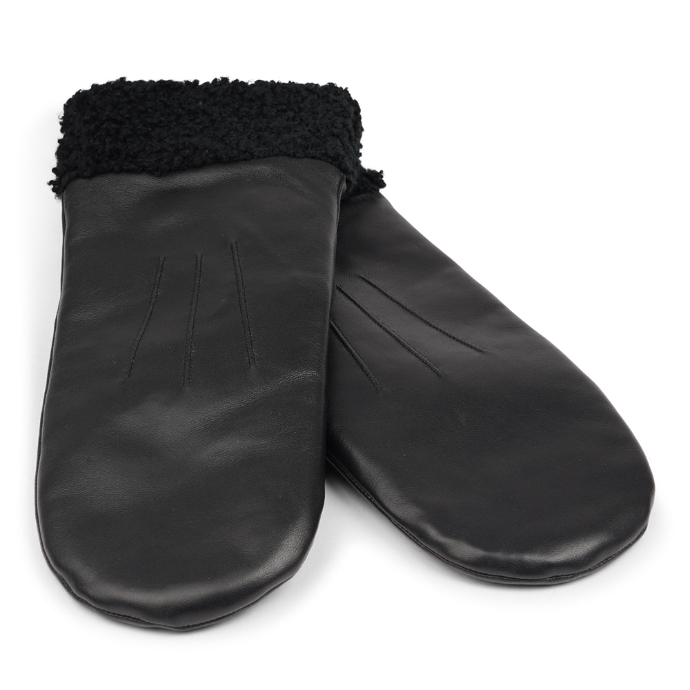 The Matera mittens are a perfect blend of elegance and warmth, crafted from premium leather and lined with soft, curly shearling.
Their feminine design offers both style and comfort, making them an ideal choice for chilly days. With a luxurious feel and timeless look, these mittens are a chic winter essential.