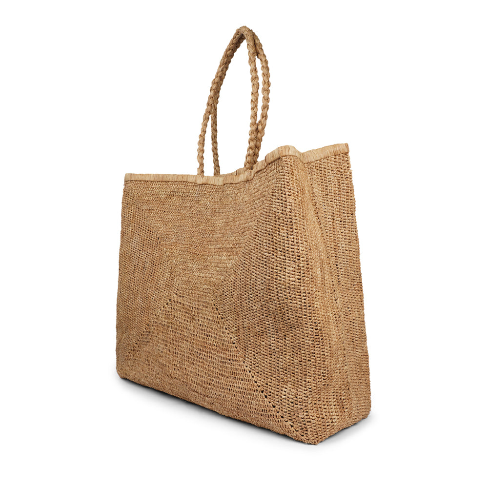 Lovelies - The delightful Casual Shoulder Shopper Bag, expertly crafted from luxurious raffia in Madagascar.
Perfect for your daily escapades, this bag offers ample space in its main compartment to hold all your essentials while you're out and about.
Raffia is a versatile and sustainable material that has become increasingly popular in the world of handbags. Derived from the leaves of the raffia palm tree, this natural fiber offers a unique blend of durability, flexibility, and eco-friendliness.