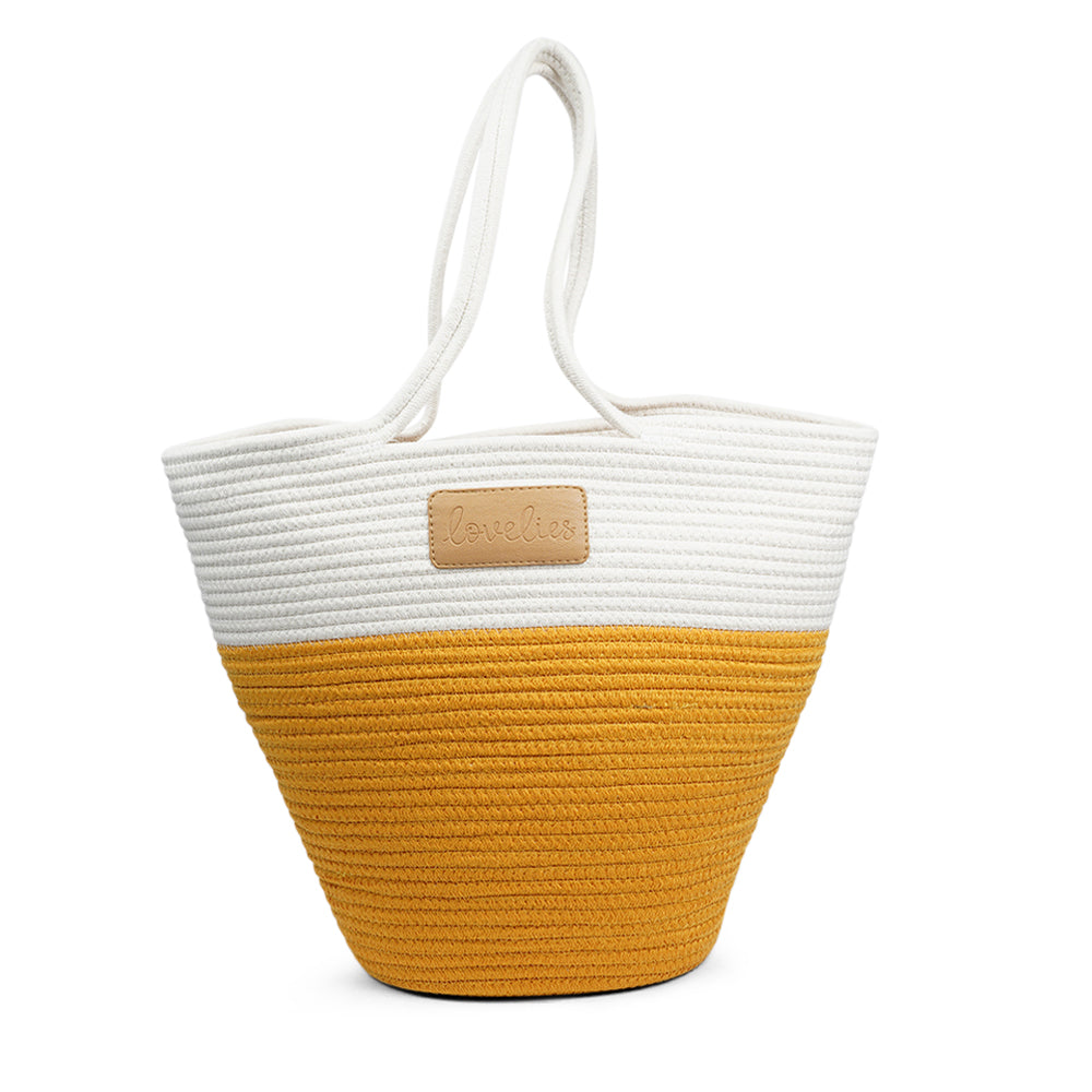 Lovelies Studio - Danish design - The NADI beach bag features a sleek and clean design, with a white upper that exudes a sense of effortless elegance. Adding a stylish twist, the bottom is adorned with a vibrant contrast color, making it a true standout accessory. At Lovelies, we prioritize both style and sustainability. That's why our Flamencos beach bag is made from a blend of cotton and recycled polyester, offering durability while minimizing our environmental impact.