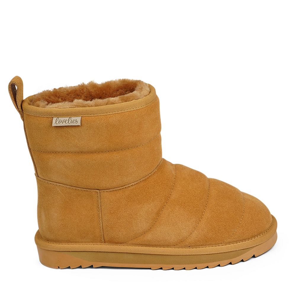 Lovelies -Nebo shearling boots - Crafted with both comfort and durability in mind, Nebo boasts a soft and resilient rubber sole that's perfect for tackling wintery conditions. And let's not forget the exquisite design that complements your style effortlessly, ensuring you're fashionably prepared for the season ahead.