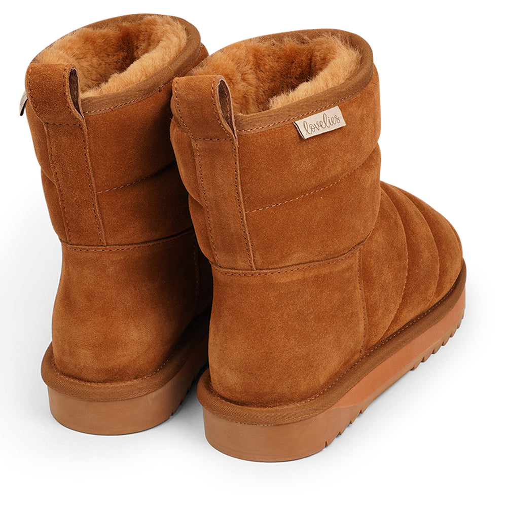 Lovelies - Nebo - Nebo, the epitome of cozy chic, is here to elevate your autumn and winter footwear game. These mid-high shearling boots are designed to envelop your feet in softness and warmth, making every step a delight. Crafted with both comfort and durability in mind, Nebo boasts a soft and resilient rubber sole that's perfect for tackling wintery conditions.