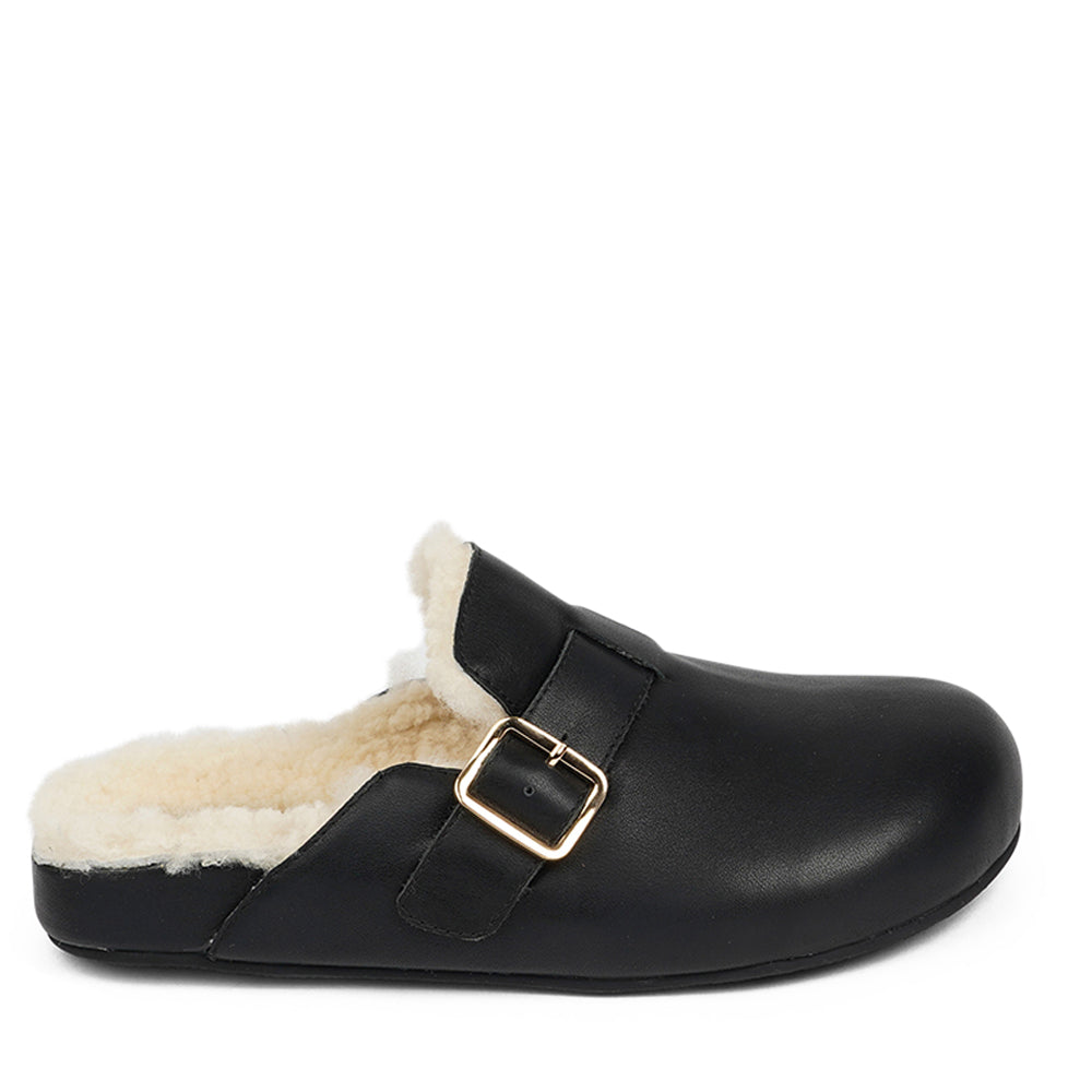 Lovelies Studio - Leather Mules with adjustable buckle and curly shearling lining  Lovelies shearling mules will bring softness and warmth to your feet this winter. The combination of soft curly shearling and the durable rubber sole guarantees the utmost comfort to the wearer.