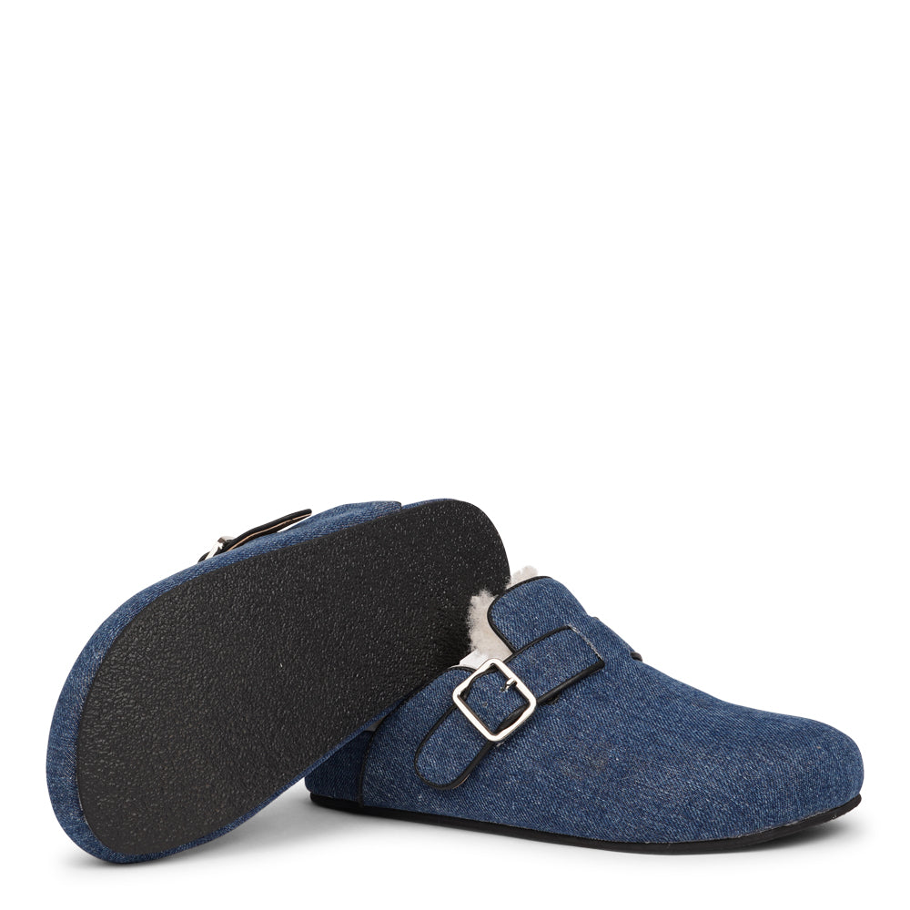 Lovelies Studio - The Nesso Denim Mules are the epitome of luxurious comfort and style. Crafted with a beautiful denim upper, these exclusive mules feature an adjustable buckle for a customized fit. Lined with soft curly shearling, they provide warmth and a cozy feel, perfect for cooler days.
The durable rubber sole ensures long-lasting wear and excellent traction, making them a practical yet indulgent choice. With their elegant design and plush materials, the Nesso Denim Mules effortlessly blend fun