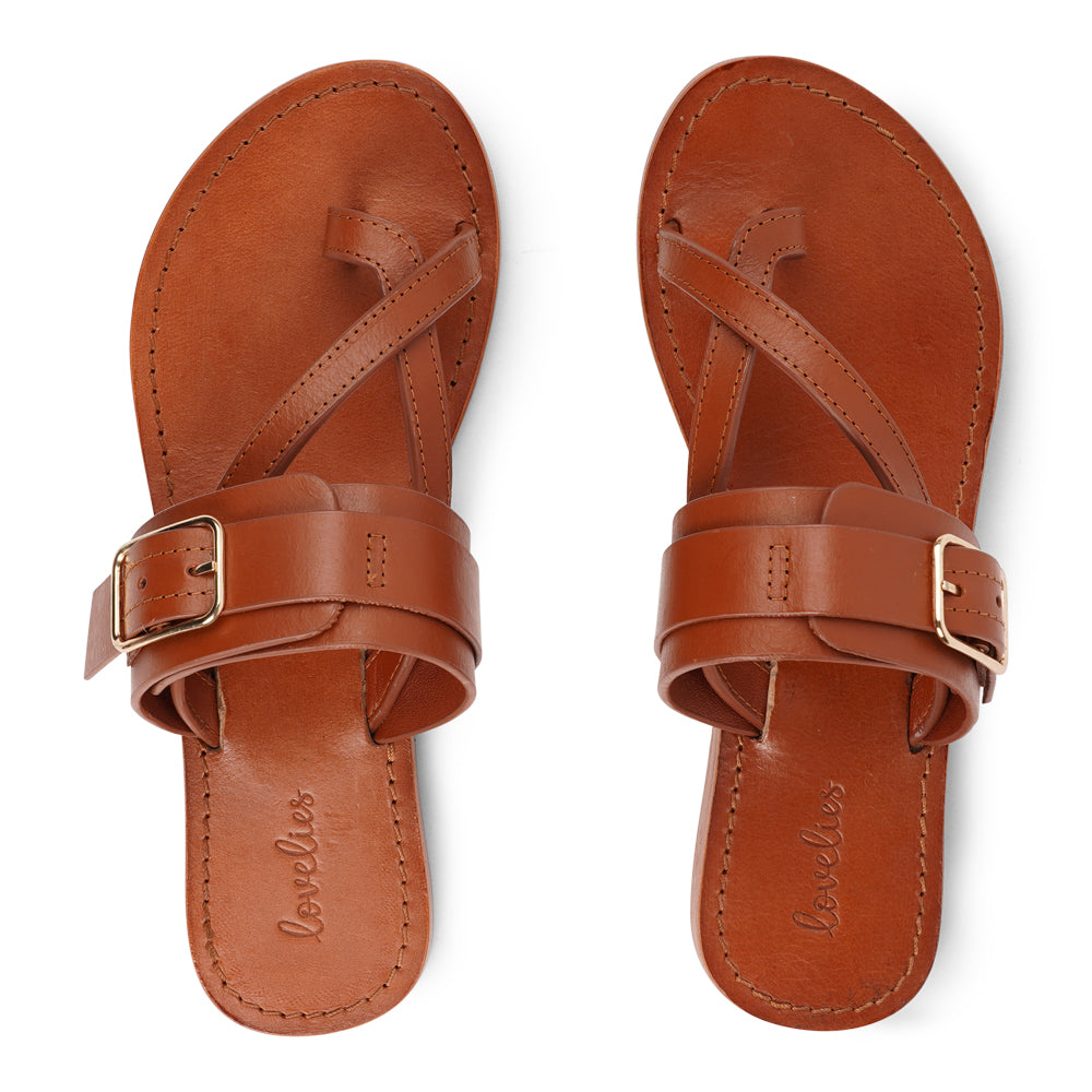 Meet Olio, our expertly handcrafted leather sandal that blends feminine charm with all-day wearability. Designed with a single adjustable buckle, it offers a secure, tailored fit that adapts effortlessly to your lifestyle.
Crafted from vegetable-tanned buffalo leather, the straps are soft, durable, and built to last. Finished with a leather sole and rubber grip, Olio ensures stability and comfort with every step—perfect for both relaxed days and dressed-up moments.