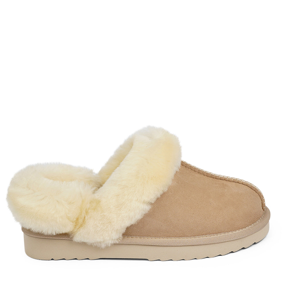 Wrap your feet in warmth and comfort this autumn with our Lovelies shearling mules. Crafted from soft shearling and finished with a durable rubber sole, they combine luxurious coziness with everyday practicality. The detachable heel strap adds versatility, making them perfect for both lounging and stepping outside in style.