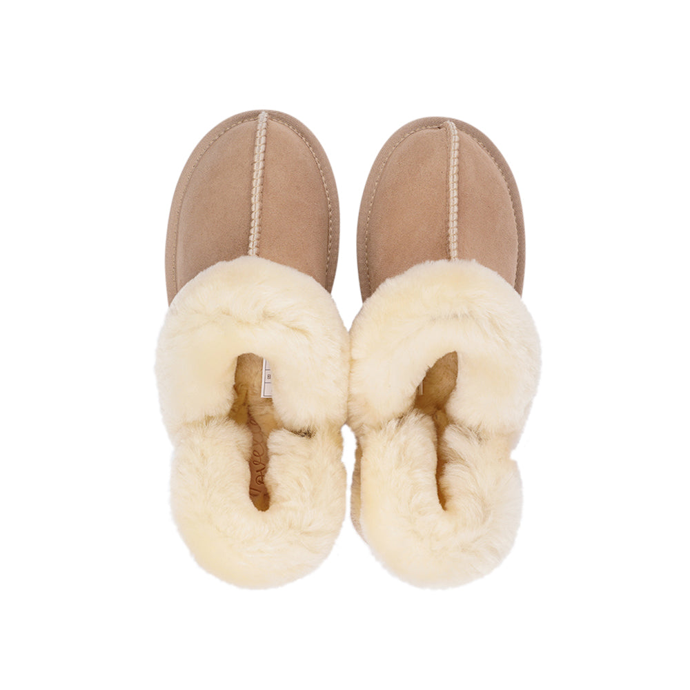 Wrap your feet in warmth and comfort this autumn with our Lovelies shearling mules. Crafted from soft shearling and finished with a durable rubber sole, they combine luxurious coziness with everyday practicality. The detachable heel strap adds versatility, making them perfect for both lounging and stepping outside in style.