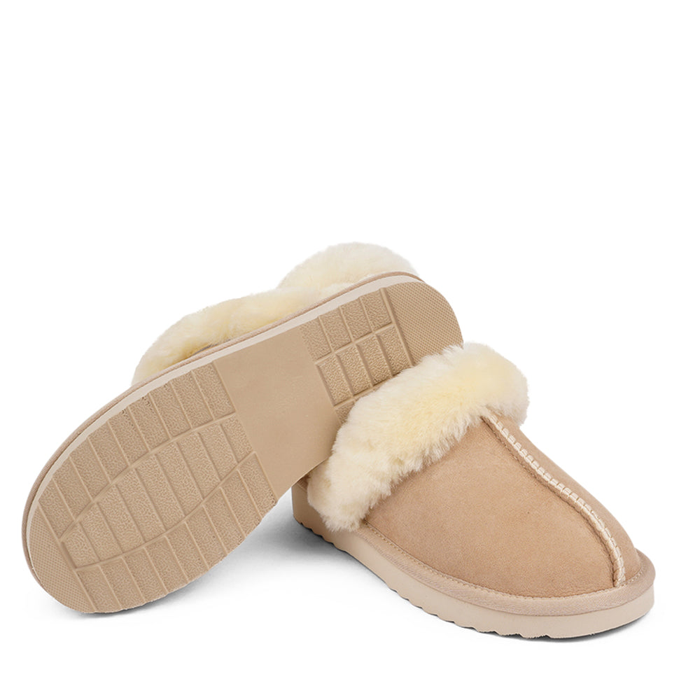 Wrap your feet in warmth and comfort this autumn with our Lovelies shearling mules. Crafted from soft shearling and finished with a durable rubber sole, they combine luxurious coziness with everyday practicality. The detachable heel strap adds versatility, making them perfect for both lounging and stepping outside in style.
