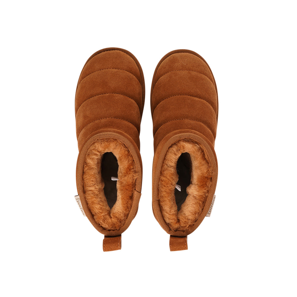 Lovelies - Ossa, Ossa, the epitome of cozy chic, is here to elevate your autumn and winter footwear game. These mid-high shearling boots are designed to envelop your feet in softness and warmth, making every step a delight. Crafted with both comfort and durability in mind, Ossa boasts a soft and resilient rubber sole that's perfect for tackling wintery conditions. And let's not forget the exquisite design that complements your style effortlessly, ensuring you're fashionably prepared for the season ahead.