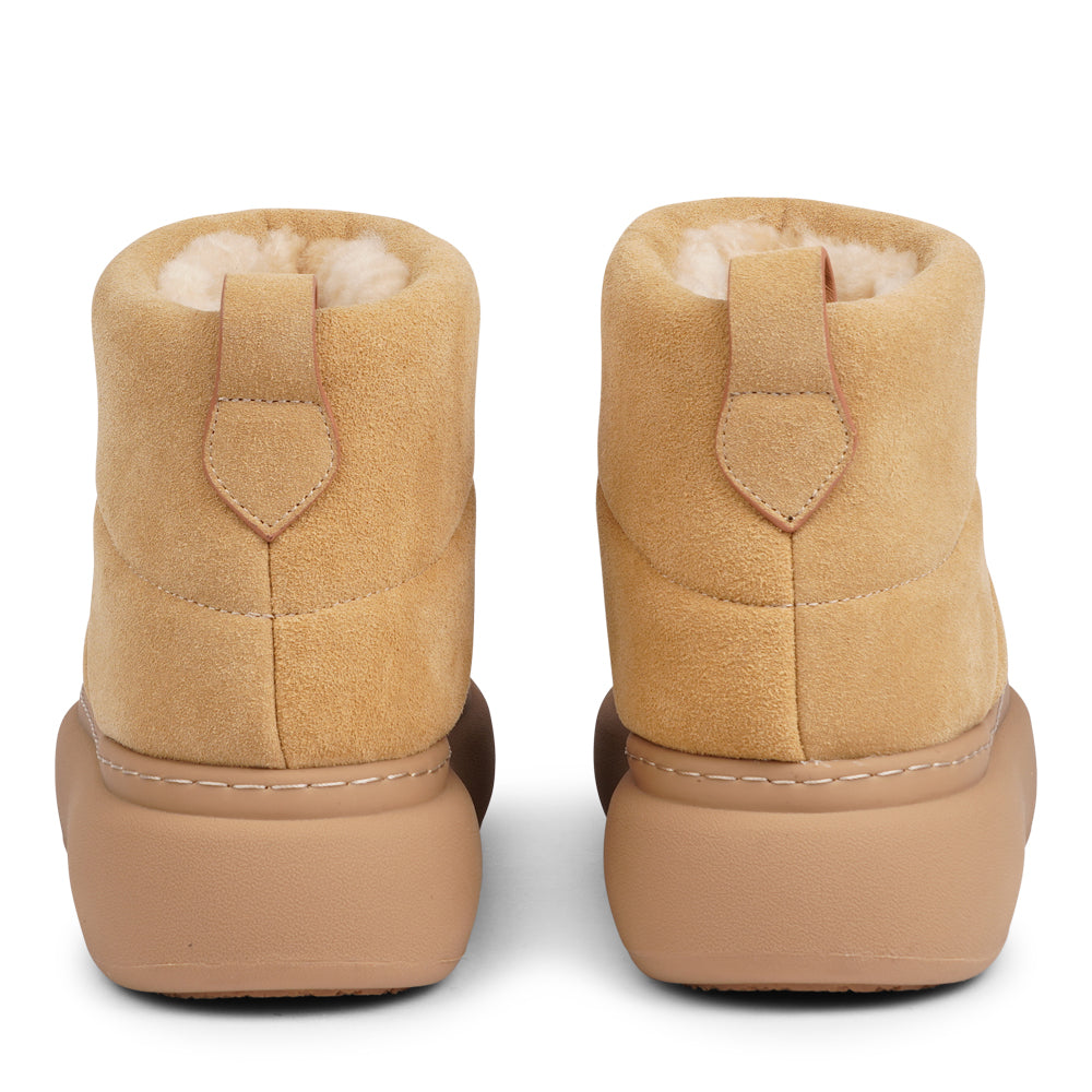 Step into autumn with the luxurious comfort of the Osura Mid-High Shearling Boots!
Crafted with plush shearling lining, these boots envelop your feet in warmth and softness, making them your go-to choice for chilly days. The durable rubber soles provide excellent traction, ensuring stability and support on any terrain.
With their stylish mid-high design, the Osura boots effortlessly combine fashion and function, making them perfect for winter outings or cozy nights in. Elevate your wardrobe with these stu