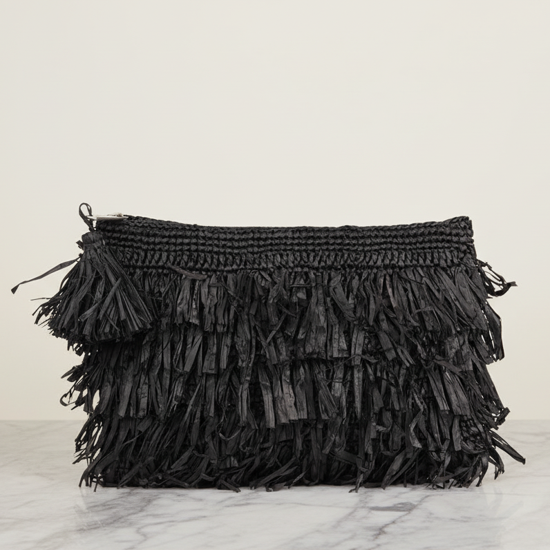 Lovelies Studio - Palau – a charming little clutch crafted from luxurious raffia.
Made from natural palm leaves, raffia is loved for its light feel and easy, eco-friendly appeal. Handwoven with care, this bag blends a relaxed vibe with a touch of elegance - perfect for both everyday moments and special occasions.
With its soft texture and natural tones, it adds effortless style to any look. Lightweight yet durable, Palau is designed to be carried with ease, day after day.