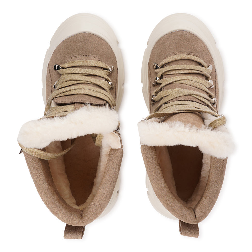 Lovelies - Meet your new go-to boots for cold-weather adventures. The Pecol trekking boots combine durability, comfort, and effortless style — built for those who want performance without compromising on looks.
Featuring a rugged yet flexible rubber sole for superior grip, every step feels steady and secure, whether you’re exploring the outdoors or strolling through the city.
Lined with soft, insulating shearling, these boots wrap your feet in warmth and comfort.