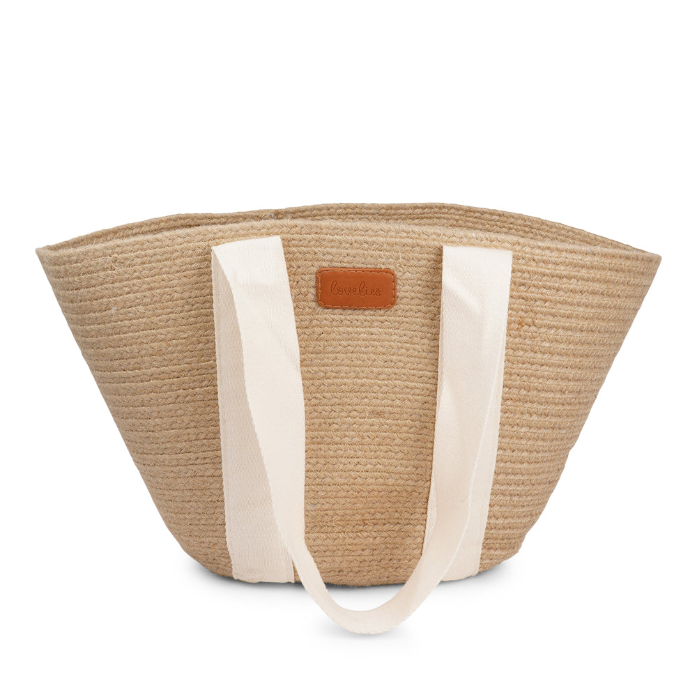 Lovelies Studio - Bring effortless style to your summer days with Peppino, our beautifully crafted beach bag made from natural jute. Lightweight yet durable, Peppino is designed to carry all your essentials while adding a touch of rustic elegance to any outfit.
The standout colorful handle brings a fun, vibrant twist to the bag’s natural texture, making it the perfect accessory for beach trips, market strolls, and sunny getaways. Spacious, stylish, and easy to pair with your favorite summer looks, Pep