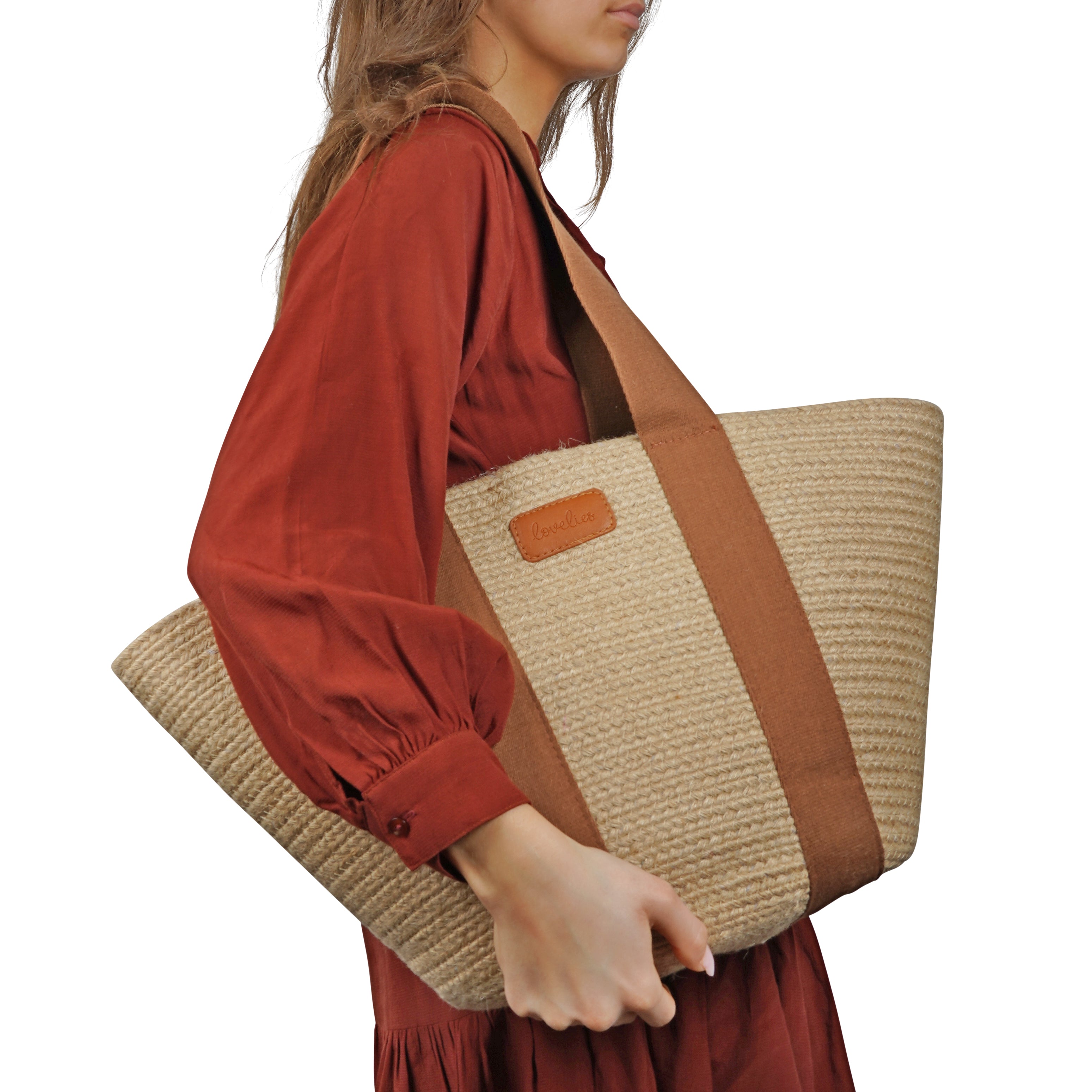 Lovelies Studio - Bring effortless style to your summer days with Peppino, our beautifully crafted beach bag made from natural jute. Lightweight yet durable, Peppino is designed to carry all your essentials while adding a touch of rustic elegance to any outfit.
The standout colorful handle brings a fun, vibrant twist to the bag’s natural texture, making it the perfect accessory for beach trips, market strolls, and sunny getaways. Spacious, stylish, and easy to pair with your favorite summer looks, Pep