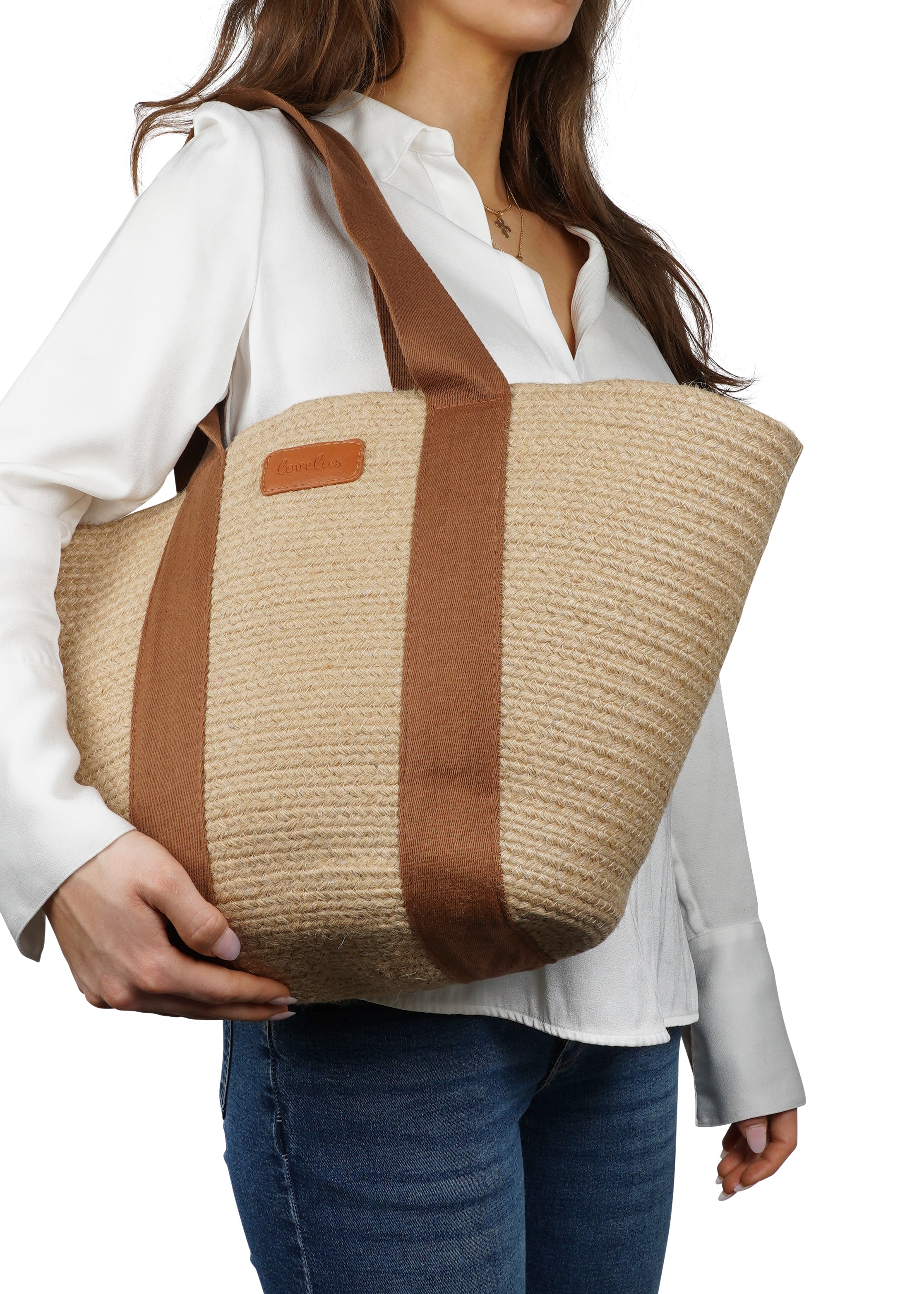 Lovelies Studio - Bring effortless style to your summer days with Peppino, our beautifully crafted beach bag made from natural jute. Lightweight yet durable, Peppino is designed to carry all your essentials while adding a touch of rustic elegance to any outfit.
The standout colorful handle brings a fun, vibrant twist to the bag’s natural texture, making it the perfect accessory for beach trips, market strolls, and sunny getaways. Spacious, stylish, and easy to pair with your favorite summer looks, Pep