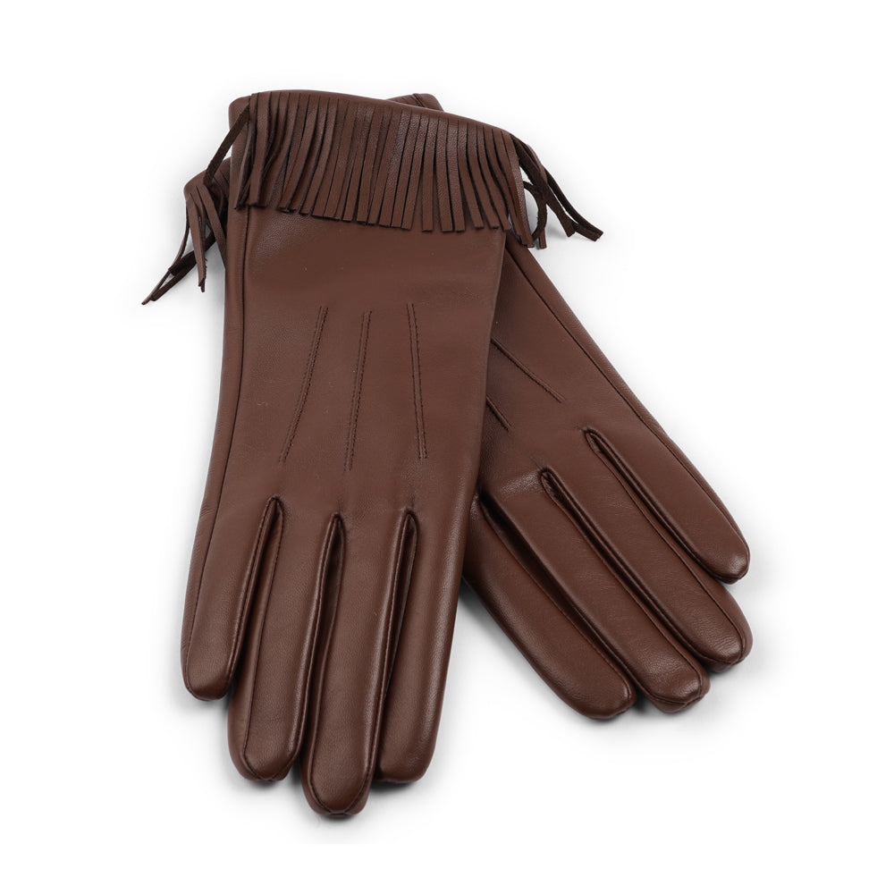 Lovelies Studio - The Pordenone gloves offer a perfect blend of bold style and luxurious comfort. Crafted from premium leather, they feature eye-catching fringe detailing for a unique look.
Lined with soft cashmere, these gloves ensure warmth and elegance, making them a standout accessory for the colder months.