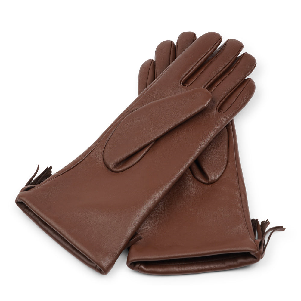 Lovelies Studio - The Pordenone gloves offer a perfect blend of bold style and luxurious comfort. Crafted from premium leather, they feature eye-catching fringe detailing for a unique look.
Lined with soft cashmere, these gloves ensure warmth and elegance, making them a standout accessory for the colder months.