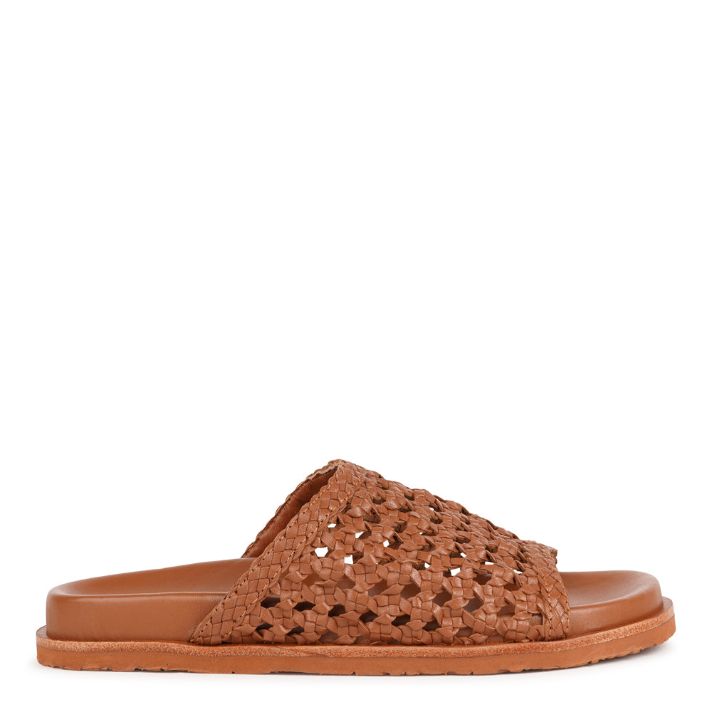 Lovelies Studio - Positano — a beautifully handcrafted leather sandal that blends feminine elegance with everyday comfort. Designed with a wide, handwoven leather strap and a soft leather insole for a natural, comfortable feel.
Crafted from vegetable-tanned leather, the supple yet durable straps are made to age beautifully over time. Finished with a durable rubber outsole for reliable grip, Positano offers both stability and ease—perfect for relaxed daytime wear and more refined evening occasions.