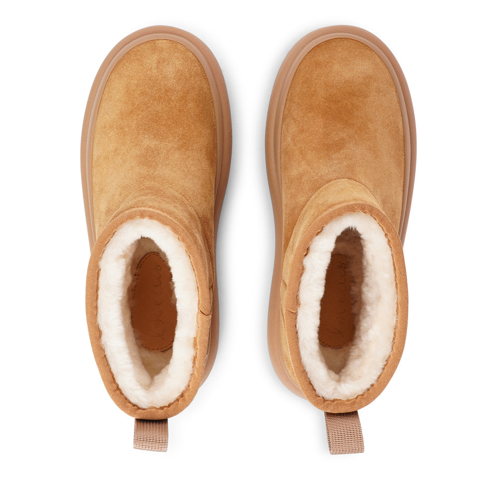 Step into autumn with the luxurious comfort of the Premana Mid-High Shearling Boots!
Crafted with plush shearling lining, these boots envelop your feet in warmth and softness, making them your go-to choice for chilly days. The durable rubber soles provide excellent traction, ensuring stability and support on any terrain.
With their stylish mid-high design, the Premana boots effortlessly combine fashion and function, making them perfect for winter outings or cozy nights in. Elevate your wardrobe with these