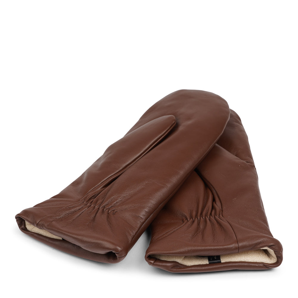 The Ravenna mittens are crafted from premium leather and feature a plush fleece lining for exceptional warmth and comfort.
With their sophisticated design and luxurious materials, these mittens offer both style and practicality, making them an essential accessory for chilly weather.