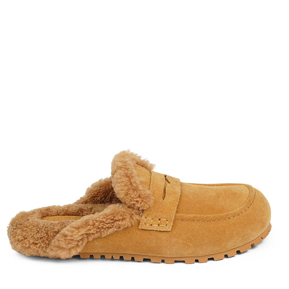 Rees - Lovelies Studio. Suede Mules with curly shearling lining Lovelies shearling mules will bring softness and warmth to your feet this autumn. The combination of soft curly shearling and the durable cork and rubber sole and guarantees the utmost comfort to the wearer.
