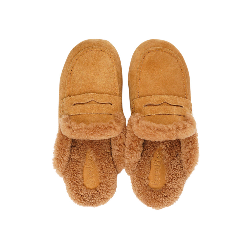 Rees - Lovelies Studio. Suede Mules with curly shearling lining Lovelies shearling mules will bring softness and warmth to your feet this autumn. The combination of soft curly shearling and the durable cork and rubber sole and guarantees the utmost comfort to the wearer.