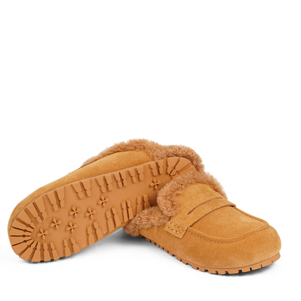 Rees - Lovelies Studio.  Suede Mules with curly shearling lining Lovelies shearling mules will bring softness and warmth to your feet this autumn. The combination of soft curly shearling and the durable cork and rubber sole and guarantees the utmost comfort to the wearer.