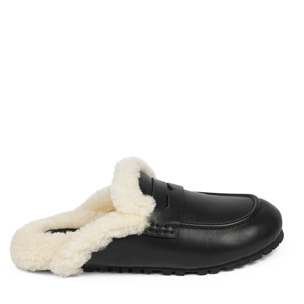 Lovelies Studio - Denmark Suede Mules with curly shearling lining  Lovelies shearling mules will bring softness and warmth to your feet this autumn. The combination of soft curly shearling and the durable cork and rubber sole guarantees the utmost comfort to the wearer.