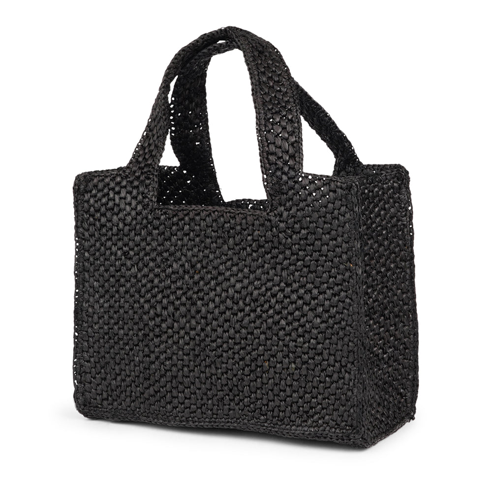 Lovelies - Effortlessly chic and naturally elegant, the Rivabella bag is your go-to accessory for sun-soaked days and breezy evenings. Handwoven from 100% raffia by skilled artisans in Madagascar, this compact yet spacious bag blends timeless craftsmanship with modern simplicity.
The raffia’s rich texture and earthy tone add a relaxed sophistication to any look—perfect for everything from a city stroll to a summer soirée. Lightweight yet durable, Rivabella is designed to accompany you all day with ease. Th